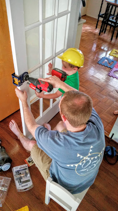 My men working on the doors Andrew got me for Mother's day!