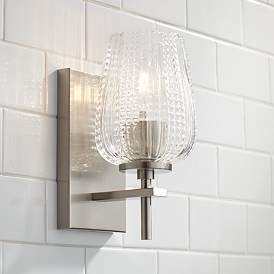 brushed nickel with textured glass wall sconce