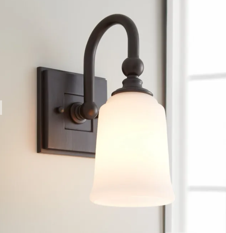 oil rubbed bronze with frosted glass bathroom sconce